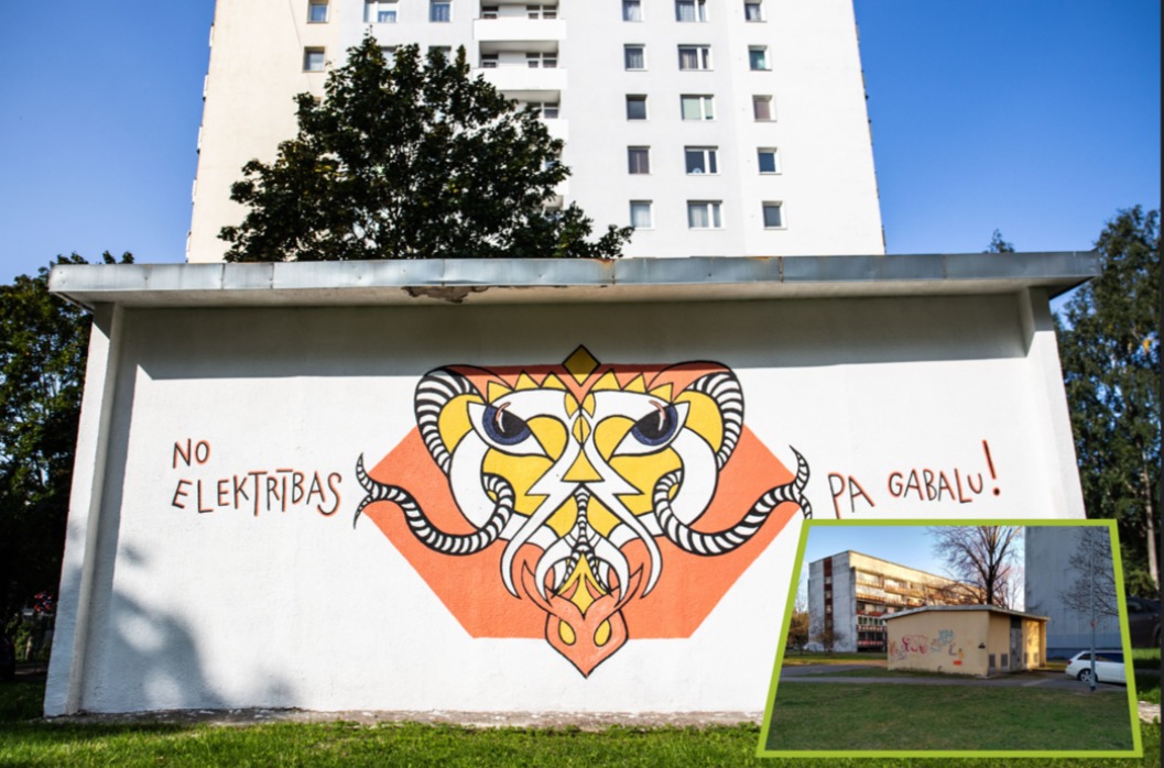 Grafiti ar stilizētu dzīvnieka motīvu un uzrakstu “No elektrības pa gabalu!” uz ēkas sienas.